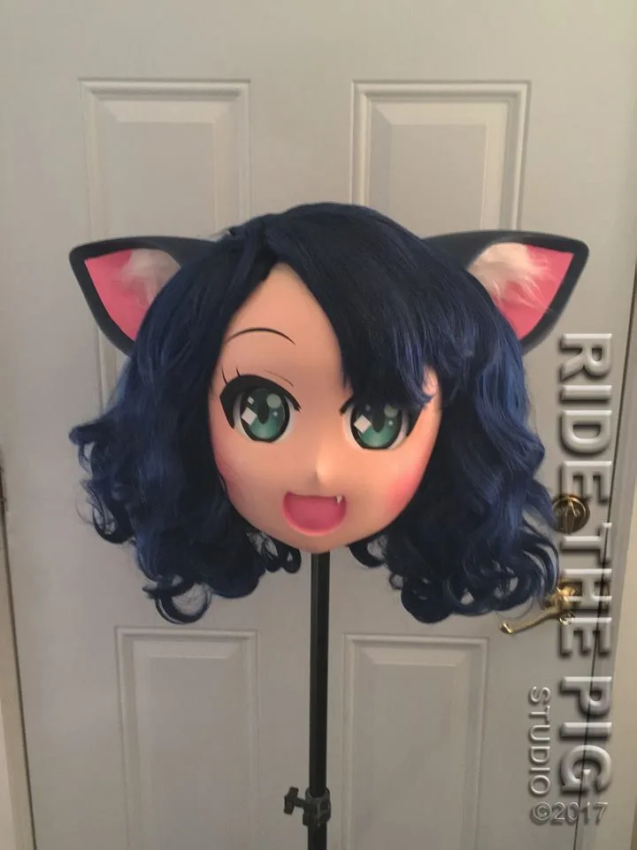 Ride the Pig Studio Cyan-style animegao mask on a stand, 2017
